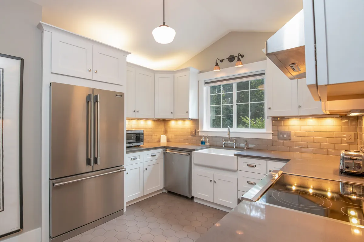 White kitchen with a French-door refrigerator
