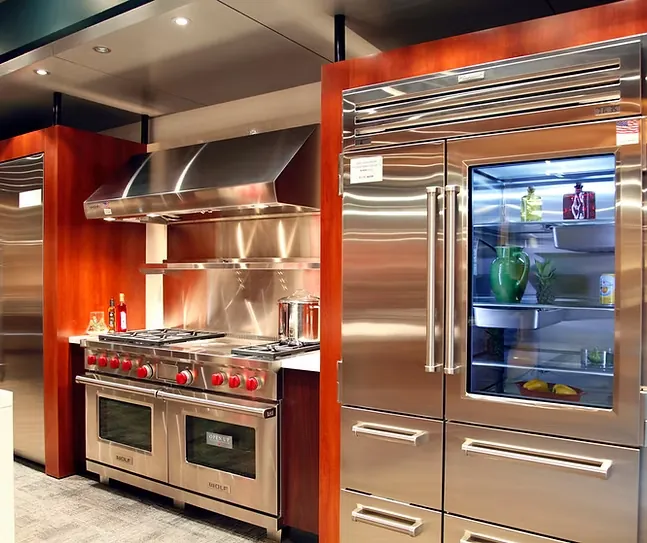 Professional range and glass-door refrigerator in a premium kitchen