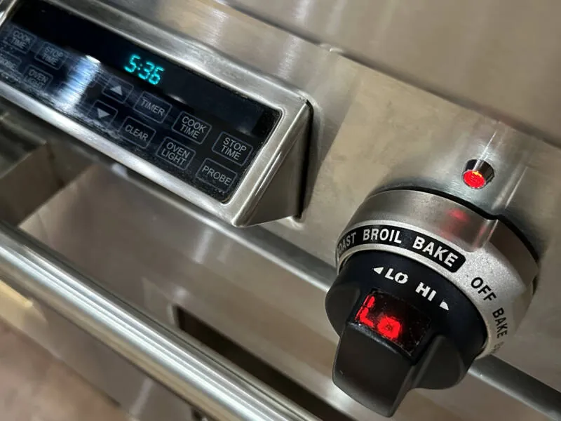 Wolf oven control knob set to low